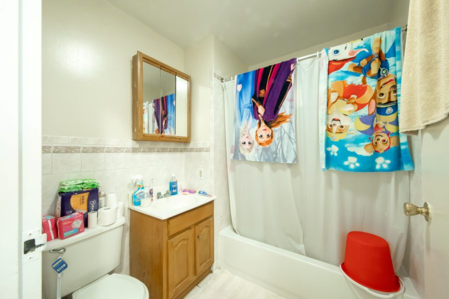 bathroom of 16 unit multifamily building for sale at maltz auctions