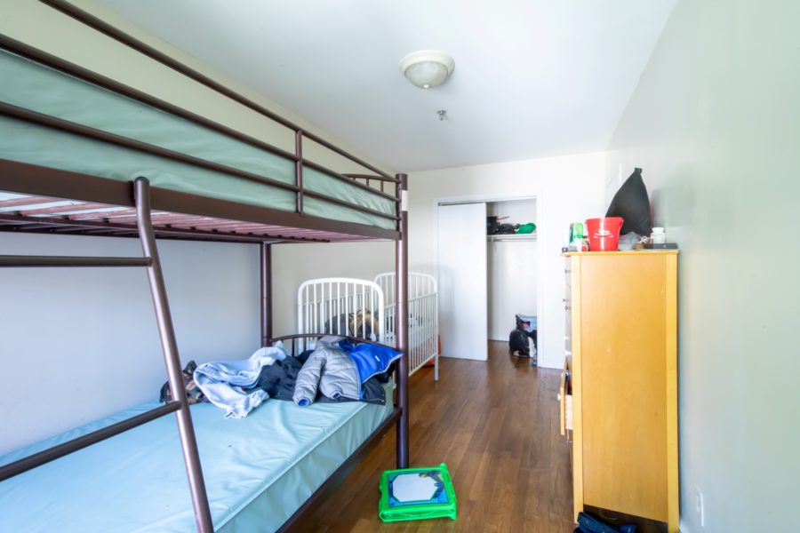 bedroom of 16-unit multifamily building for sale at maltz auctions in new york