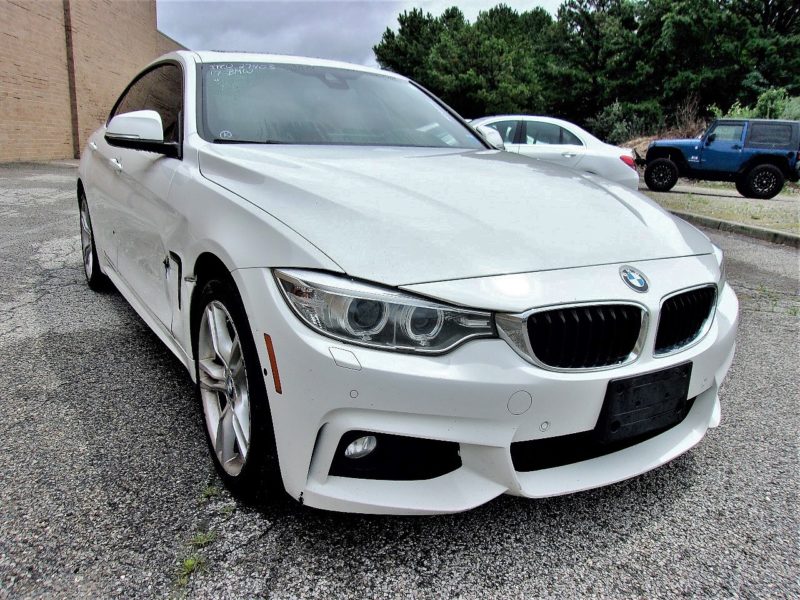 white automobile for sale at maltz auctions in new york city