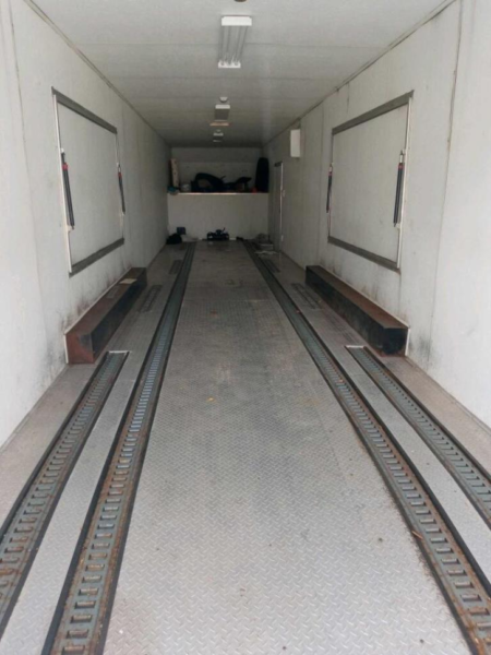 inside of large trailer for sale at maltz auctions