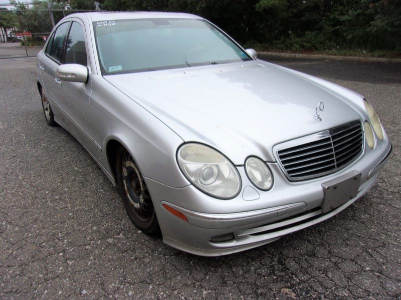 Silver automobile up for auction at Maltz Auctions
