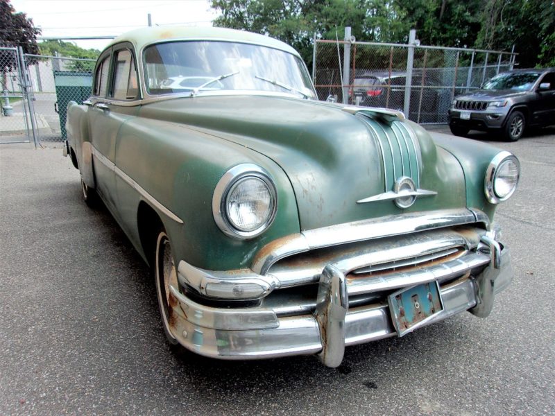 Front view of old classic Pontiac up for auction at Maltz Auctions in NY