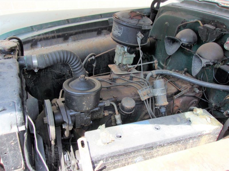 Side view of engine of classic Pontiac up for auction at Maltz Auctions in New York