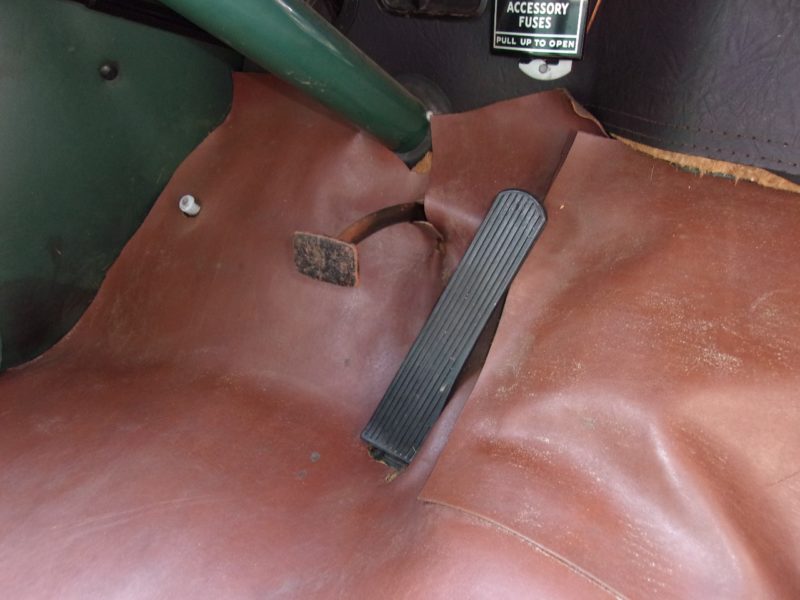 Close up of gas and break pedals on classic Pontiac car up for auction at Maltz Auctions in New York