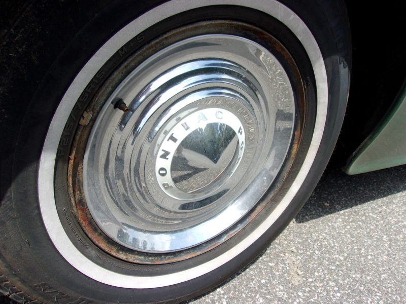 Tire of old Pontiac up for auction at Maltz Auctions