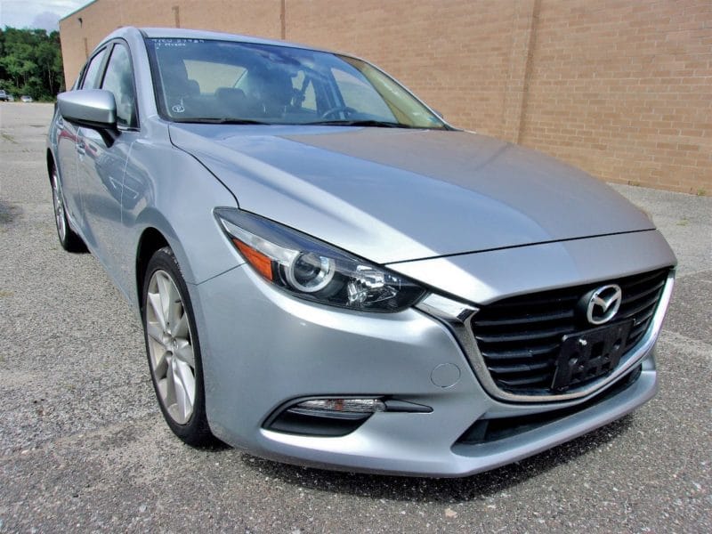 Silver Mazda car up for auction at Maltz Auctions in New York