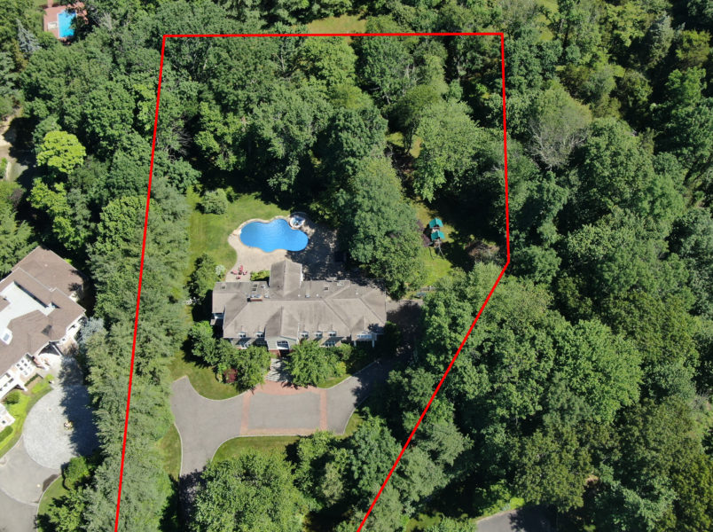 birds-eye view of 6 bedroom luxury home on 2 plus acres