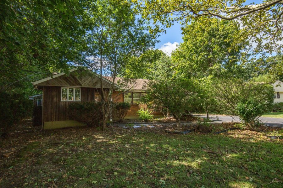 front of home for sale at Maltz Auctions