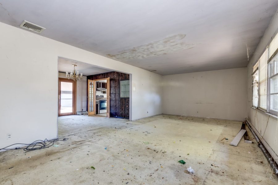 living room of home for sale at Maltz Auctions