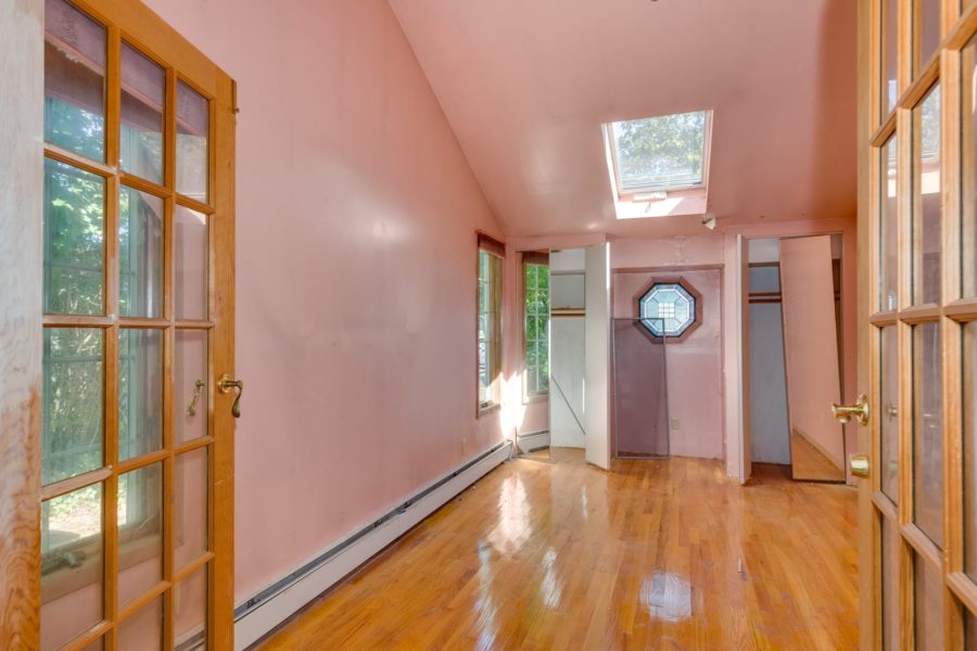 room of house up for sale at Maltz Auctions