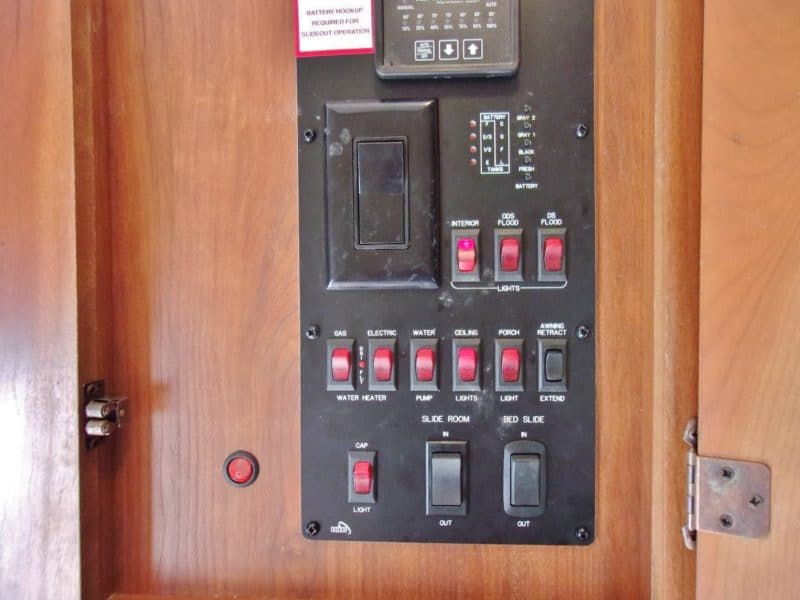 Lighting control panel of inside of travel trailer - buy at Maltz Auctions