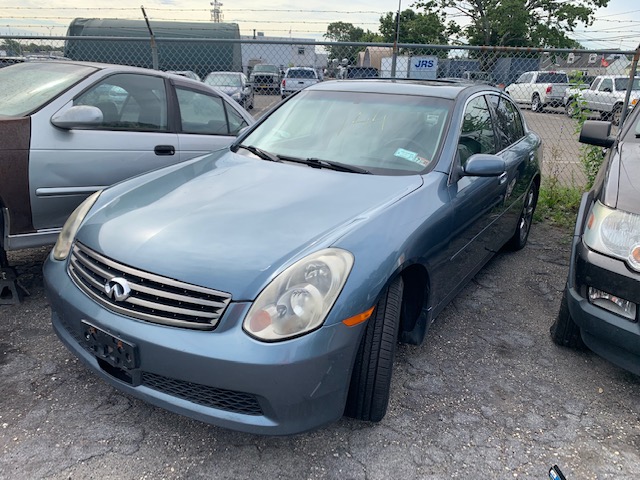 Blue car up for automobile auction at Maltz Auctions in NYC, New York