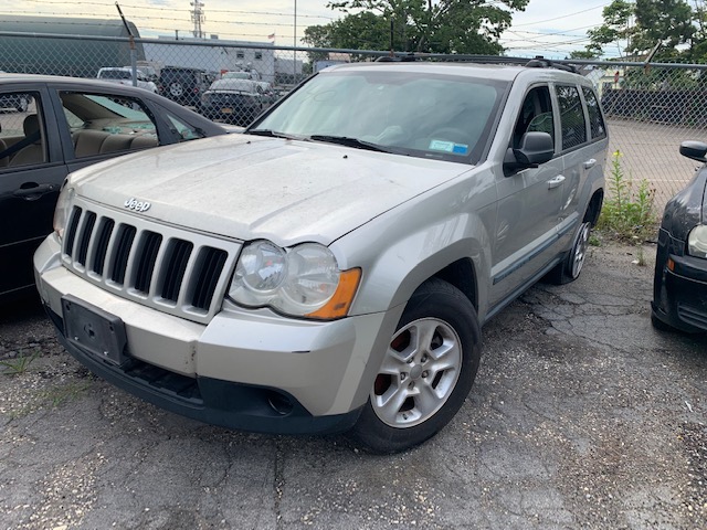 Buy silver Jeep automobile at auction at Maltz Auctions in NYC, New York