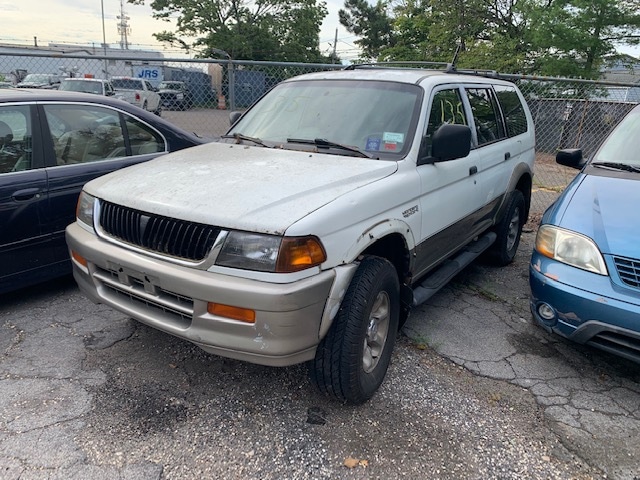 White automobile up for auction, buy car at Maltz Auctions in NYC, New York