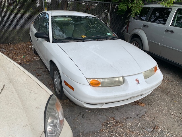 White automobile up for auction at Maltz Auctions in NYC, New York