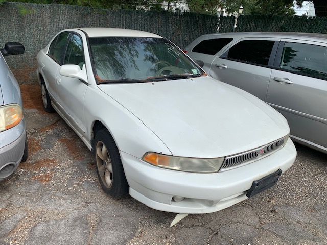 White automobile up for auction - buy more cars at auction at Maltz Auctions