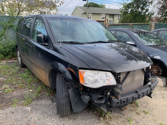 Damaged automobile sitting in Maltz Auctions parking lot for sale at auction