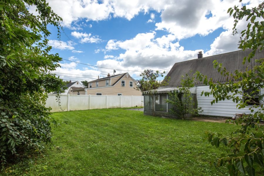 zoomed out view of backyard for sale at Maltz Auctions