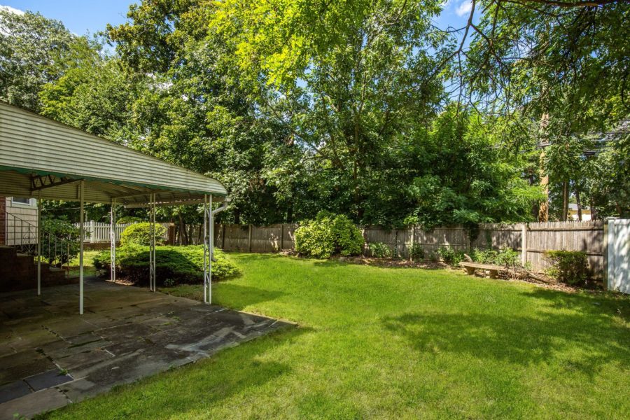 backyard of home for sale at Maltz Auctions