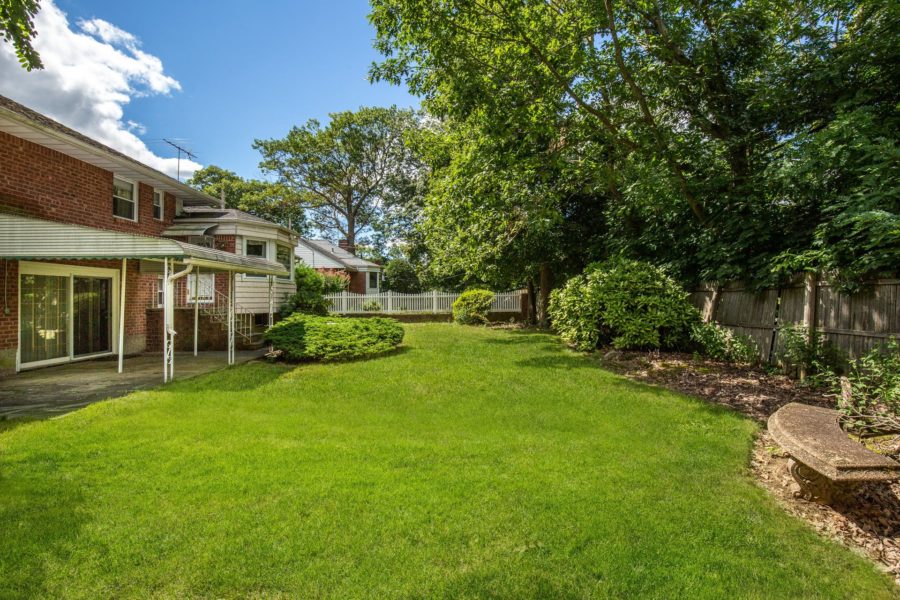 backyard of home for sale at Maltz Auctions