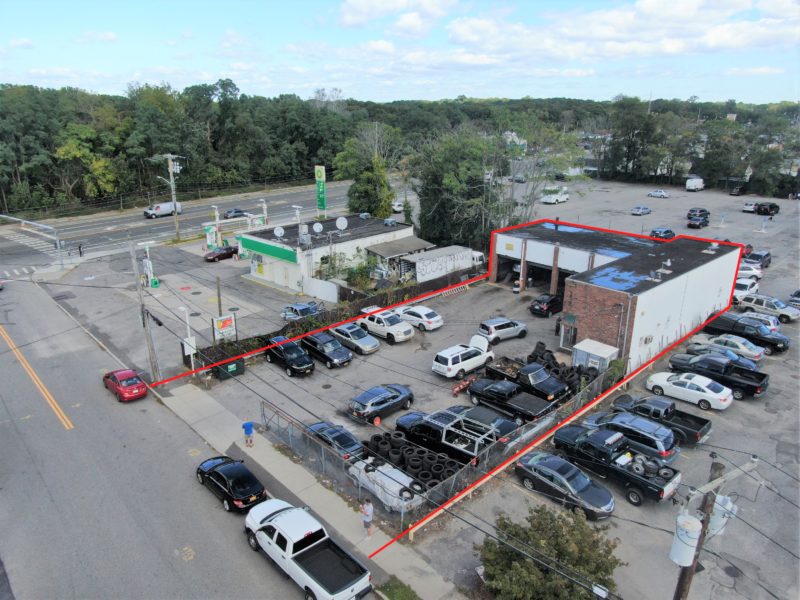 view of parking lot at net leased repair shop