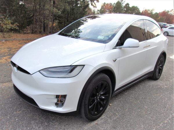 white telsa vehicle for sale at maltz auto auctions in new york city