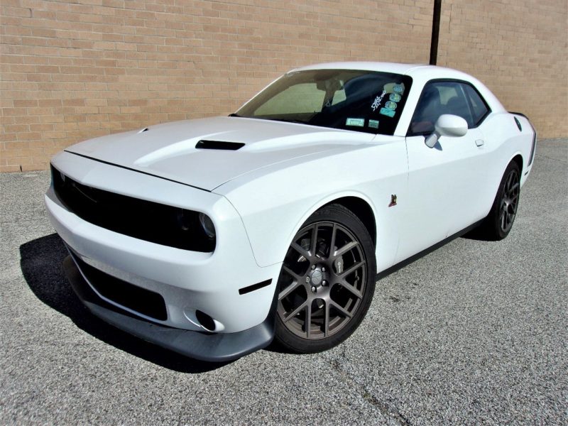 white vehicle for sale at maltz auctions in new york city