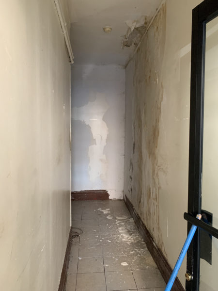 interior hallway of mixed use building for sale by maltz auctions